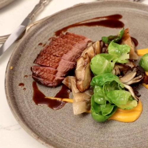 Chef Rich Wilson of the Beckta Group demonstrates how to prepare his signature dish, Duck Magret, in a new Gemstone kitchen in a Peridot home for sale in Ottawa